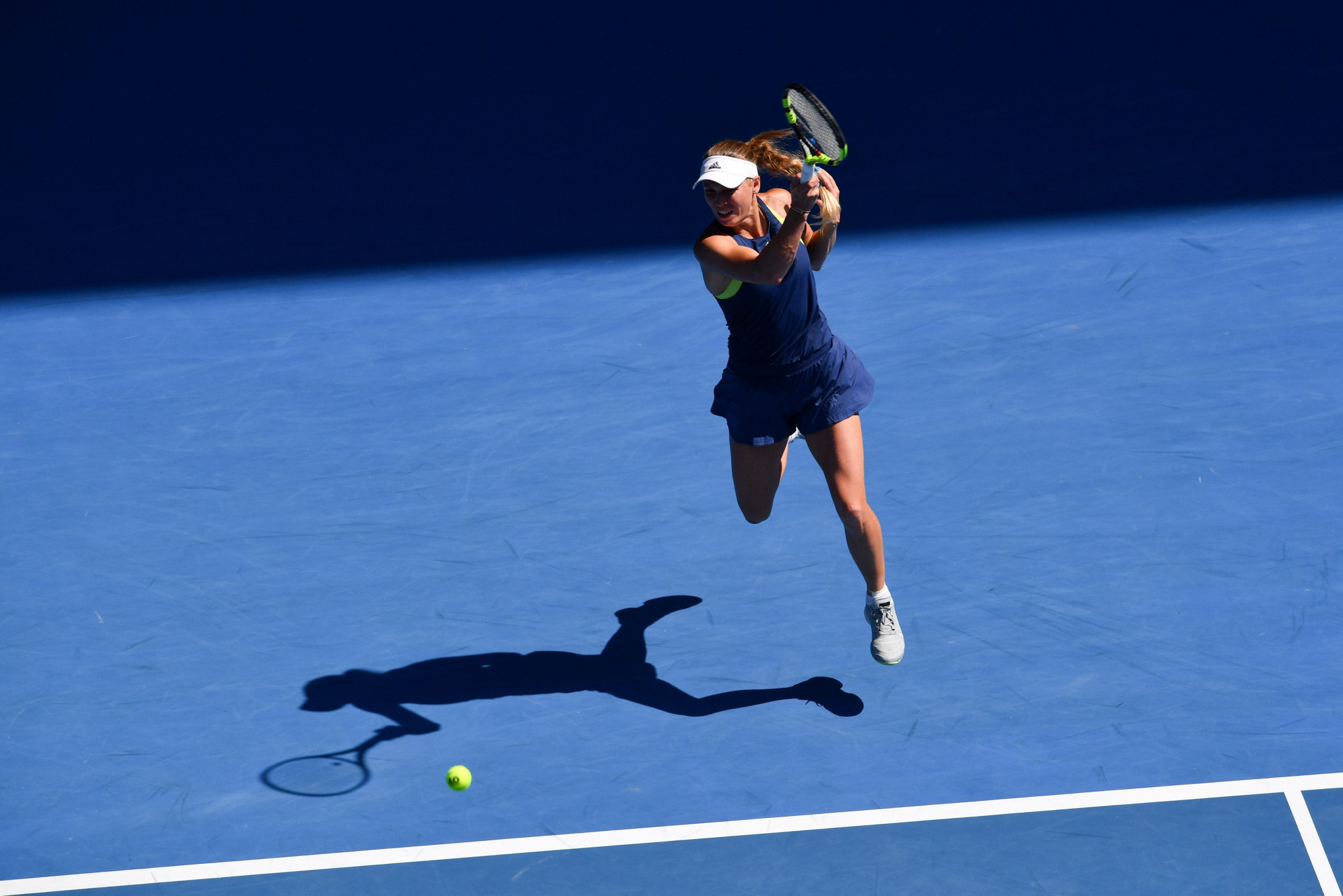 Caroline Wozniacki will take on Simona Halep in the women's singles final ©Getty Images