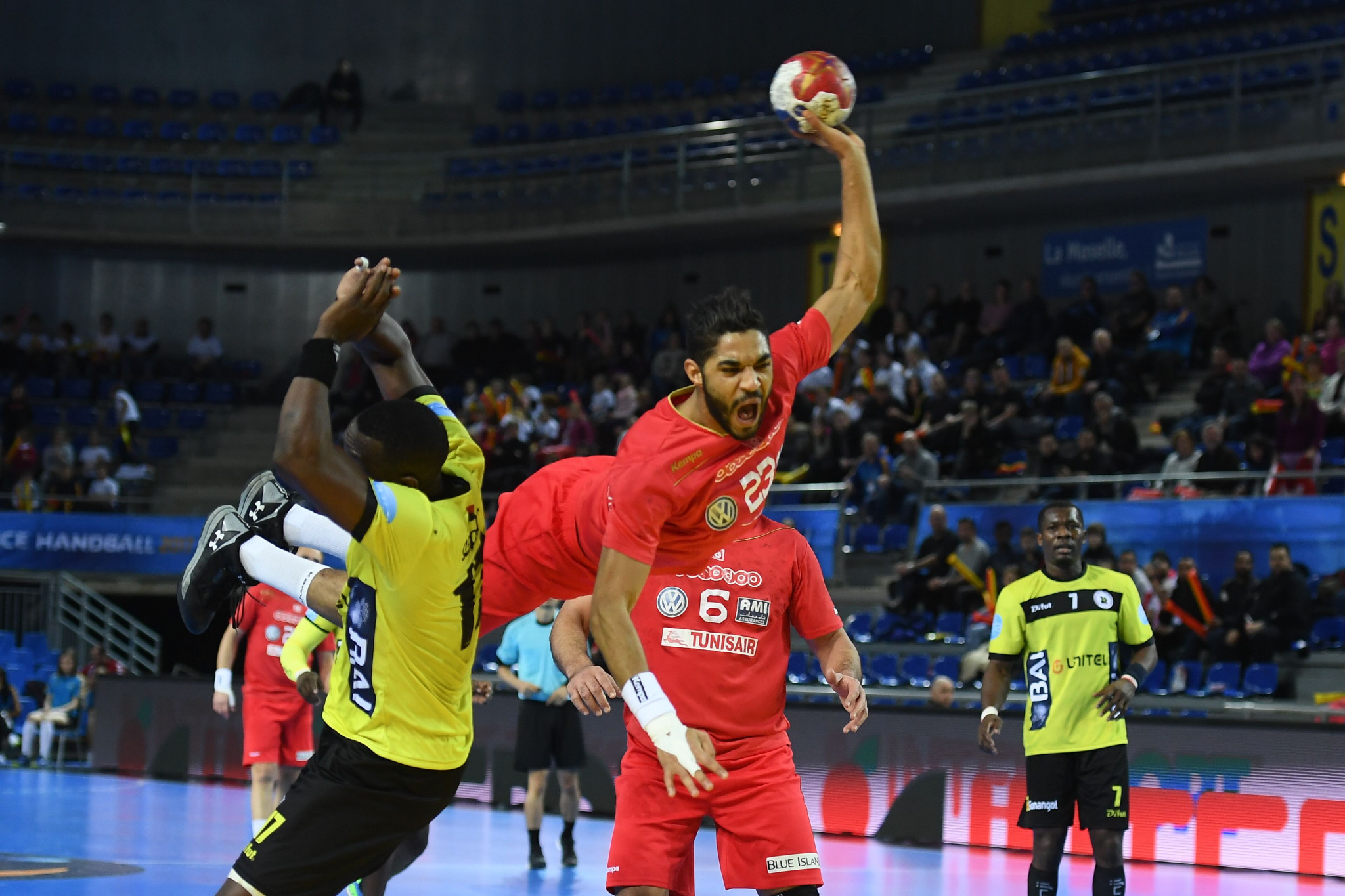 Tunisia, red, defeated Angola, yellow, in last year's World Championship in France ©Getty Images