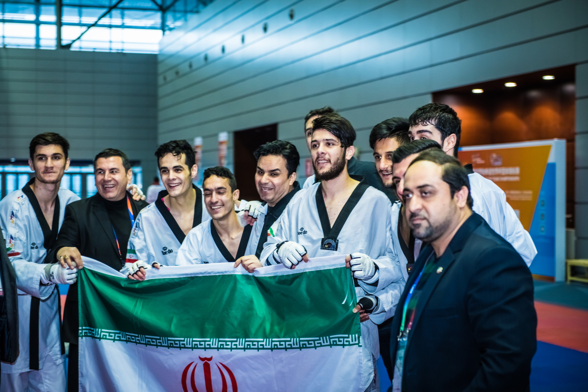 Iran celebrate victory in the men's competition ©World Taekwondo