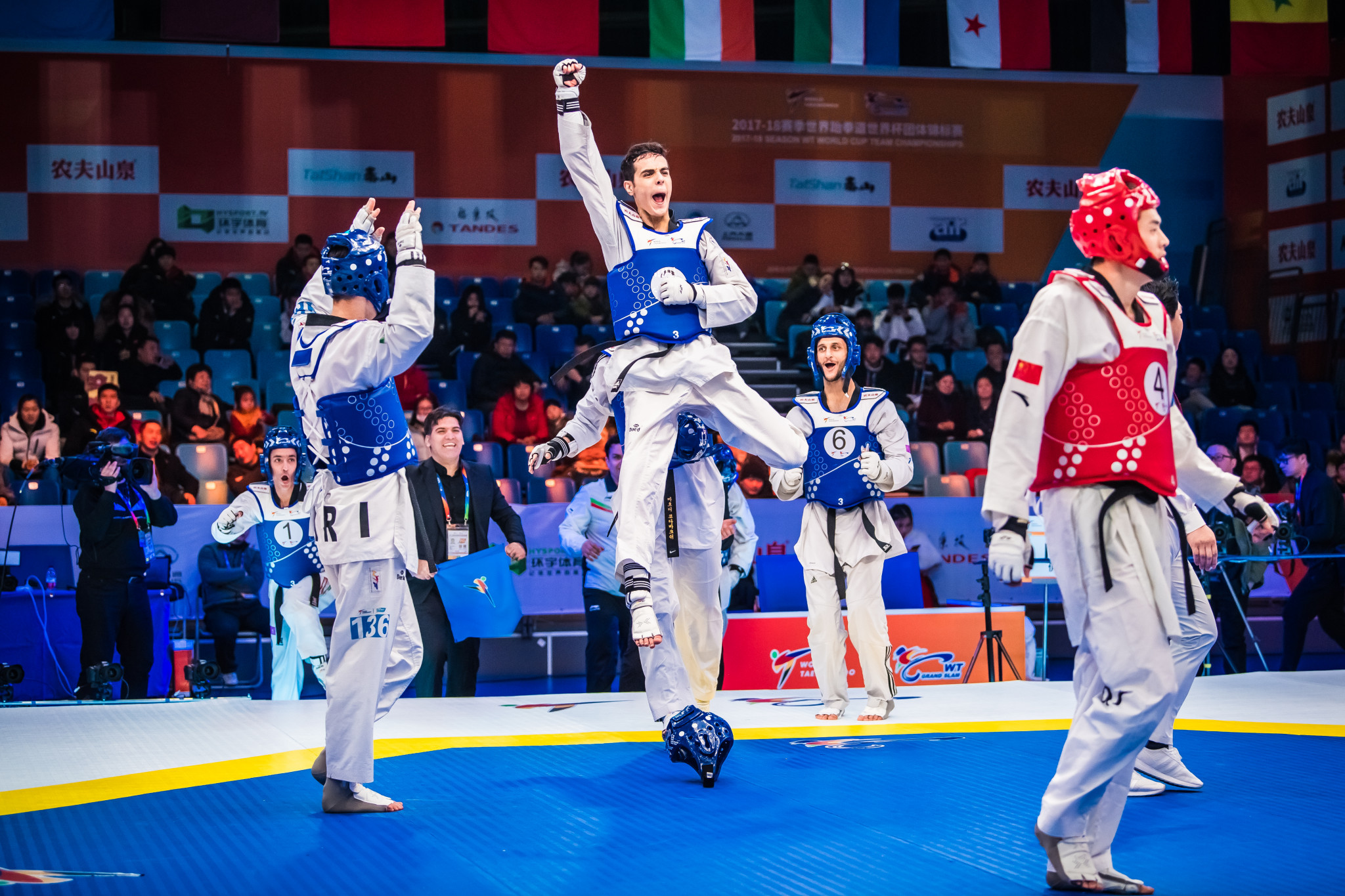 Iran celebrate winning the men's competition ©World Taekwondo