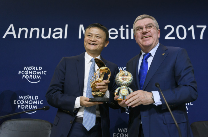 Jack Ma, chief executive of the Chinese technology giant Alibaba, pictured with International Olympic Committee President Thomas Bach at last year's World Economic Summit in Davos, where Alibaba were announced as an IOC TOP sponsor through to 2028 ©Getty Images