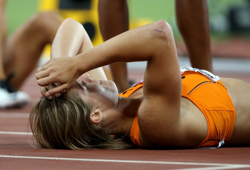 Down but not out - Dafne Schippers recovers after winning the world 200m title in a Championship record of 21.63 ©Getty Images
