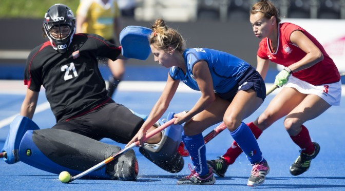 Italy secured a vital point in their bid to remain in European hockey's top tier as they drew 1-1 with Poland