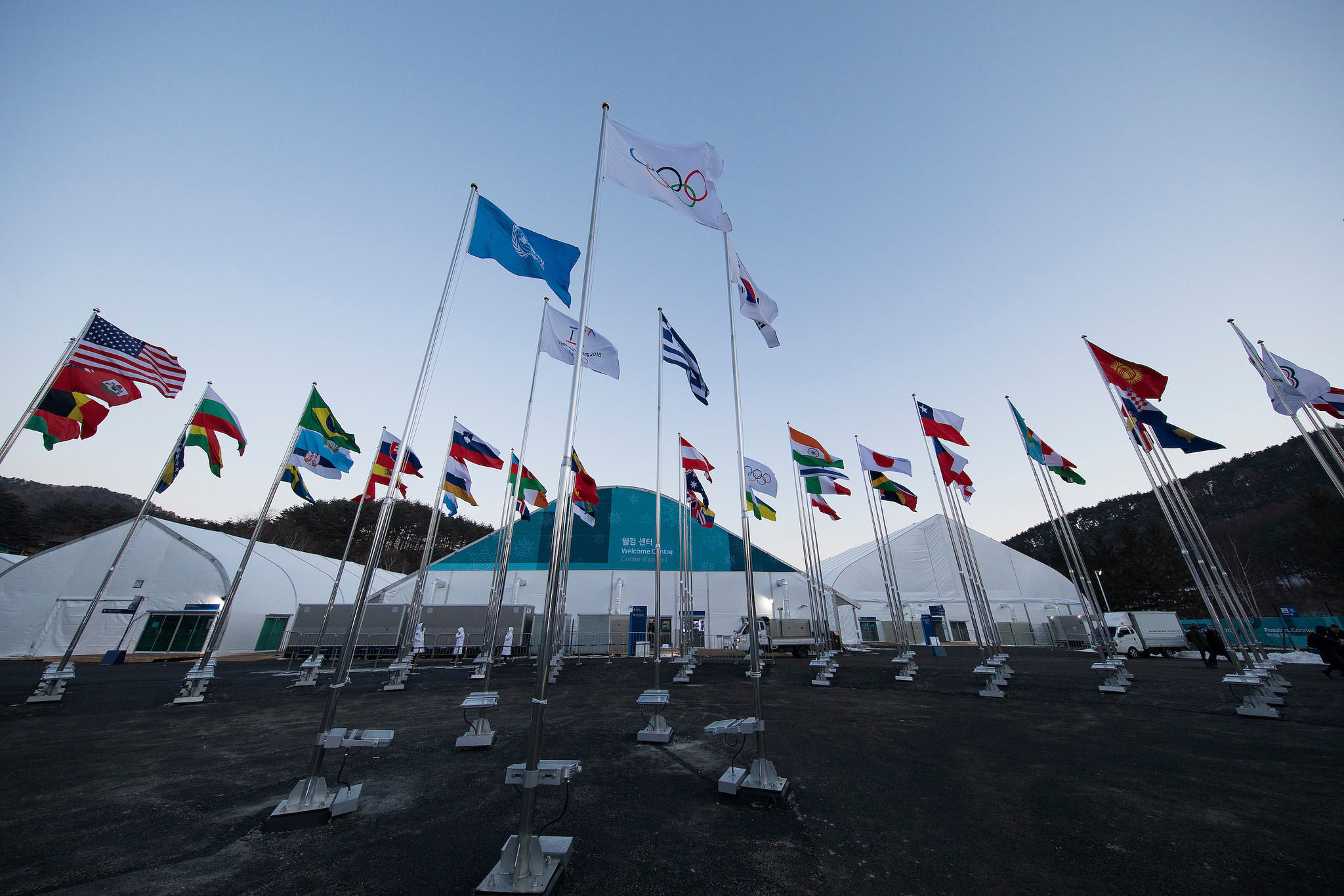 Flags of participating countries outside the Athletes' Village ©IOC/Flickr