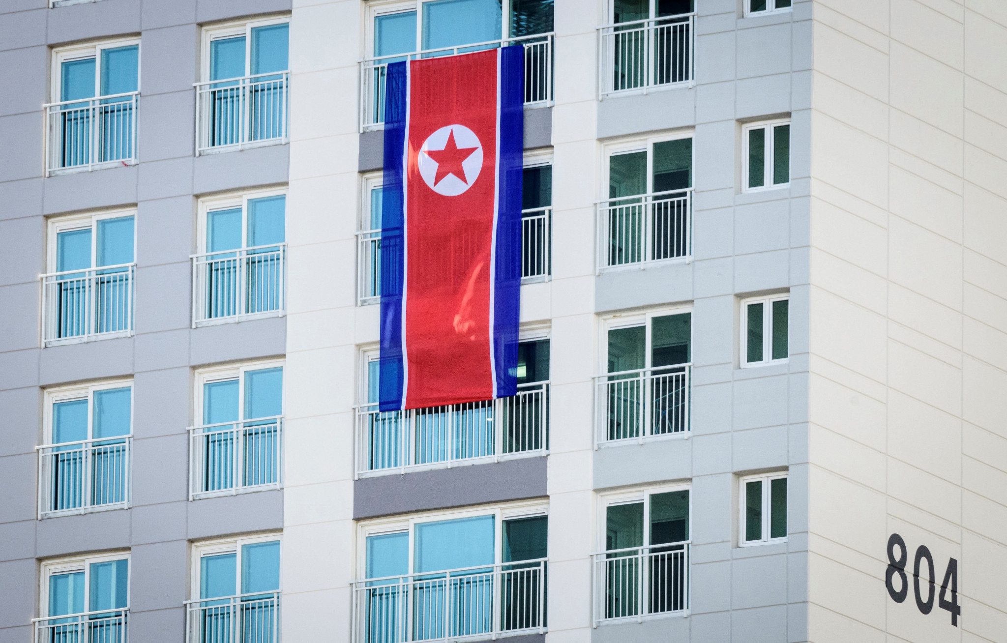A North Korean flag is flown at the coastal Athletes' Village ©Getty Images