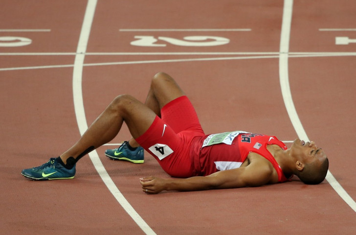 Ashton Eaton of the United States, exhausted after the concluding 1500m, is about to hear he has broken his own world decathlon record. Or maybe already has. ©Getty Images