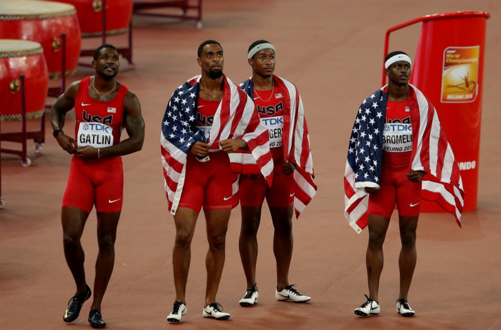 The dollar drops - as the US men's sprint relay team (from left) Justin Gatlin, Tyson Gay, MIke Rodgers and Trayvon Bromell - realise they have been disqualified ©Getty Images