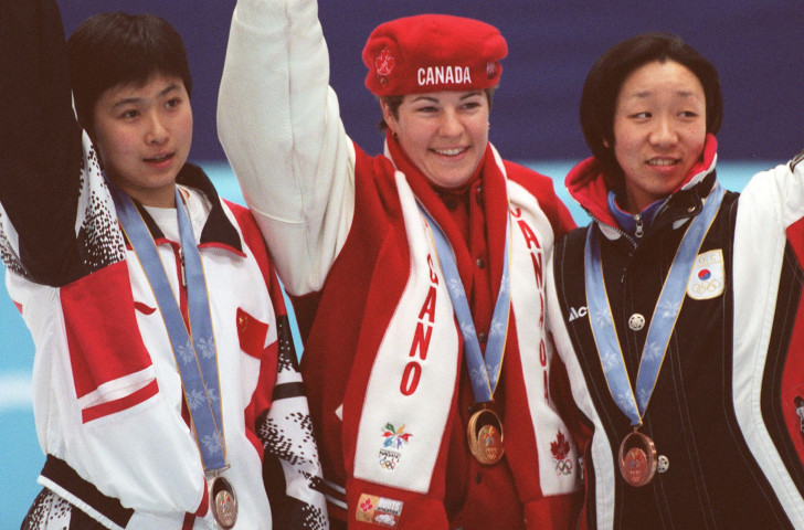 South Korea's Chun Lee-kyung, right, took bronze in the 1998 Winter Olympic 500m short track speed skating final - even though her time was faster than that of silver medallist Yang Yang of China, left, and Canada's gold medallist Annie Perreault ©Getty Images