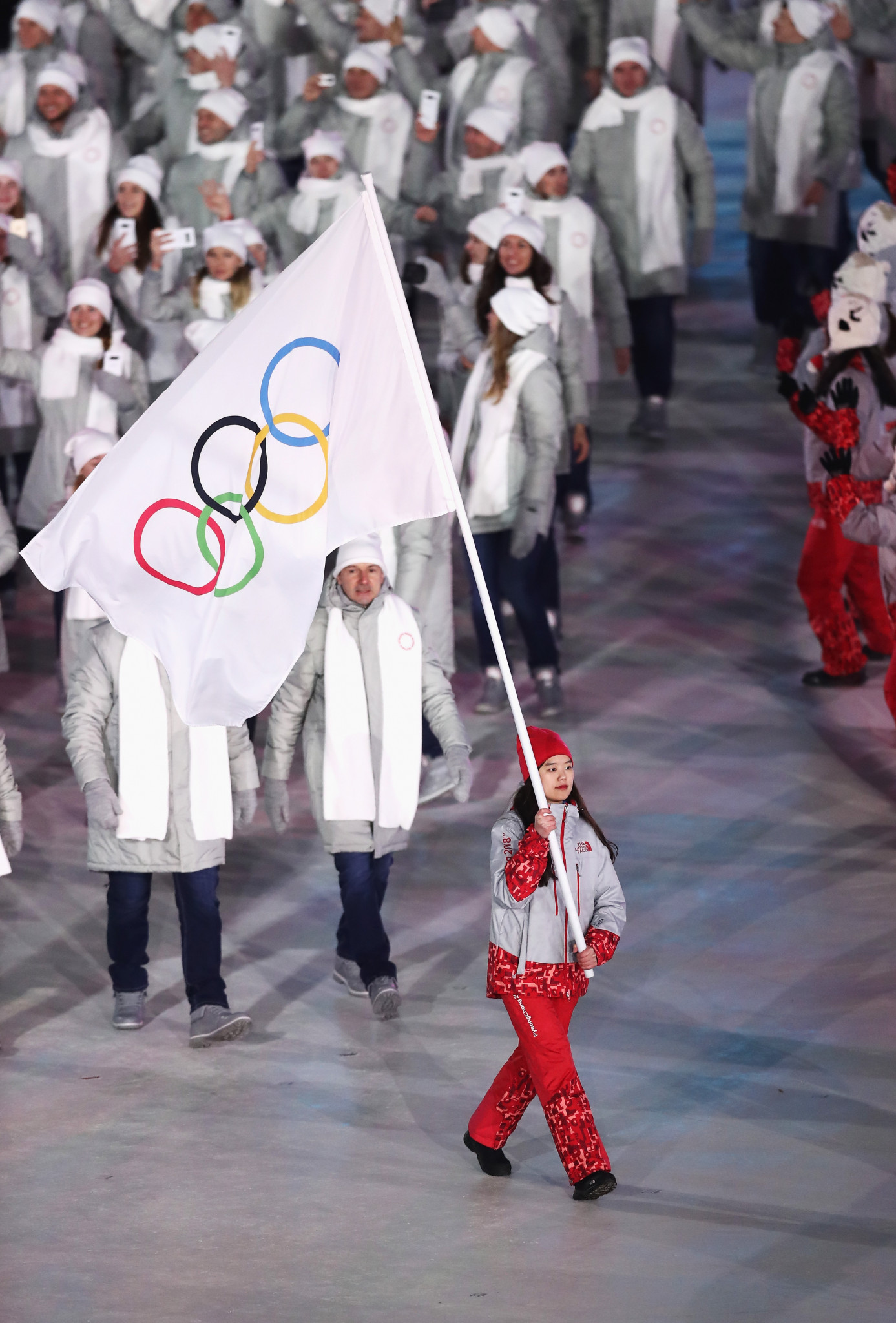 A volunteer leads out the Olympic Athletes from Russia team ©Getty Images