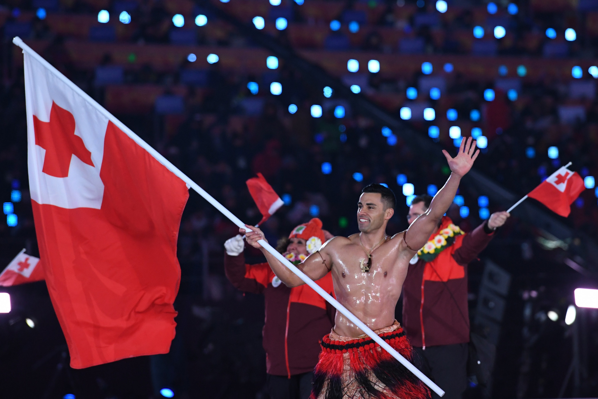Tongan flagbearer Pita Taufatofua marching topless for the second consecutive Olympic Games Opening Ceremony provided a light-hearted moment ©Getty Images
