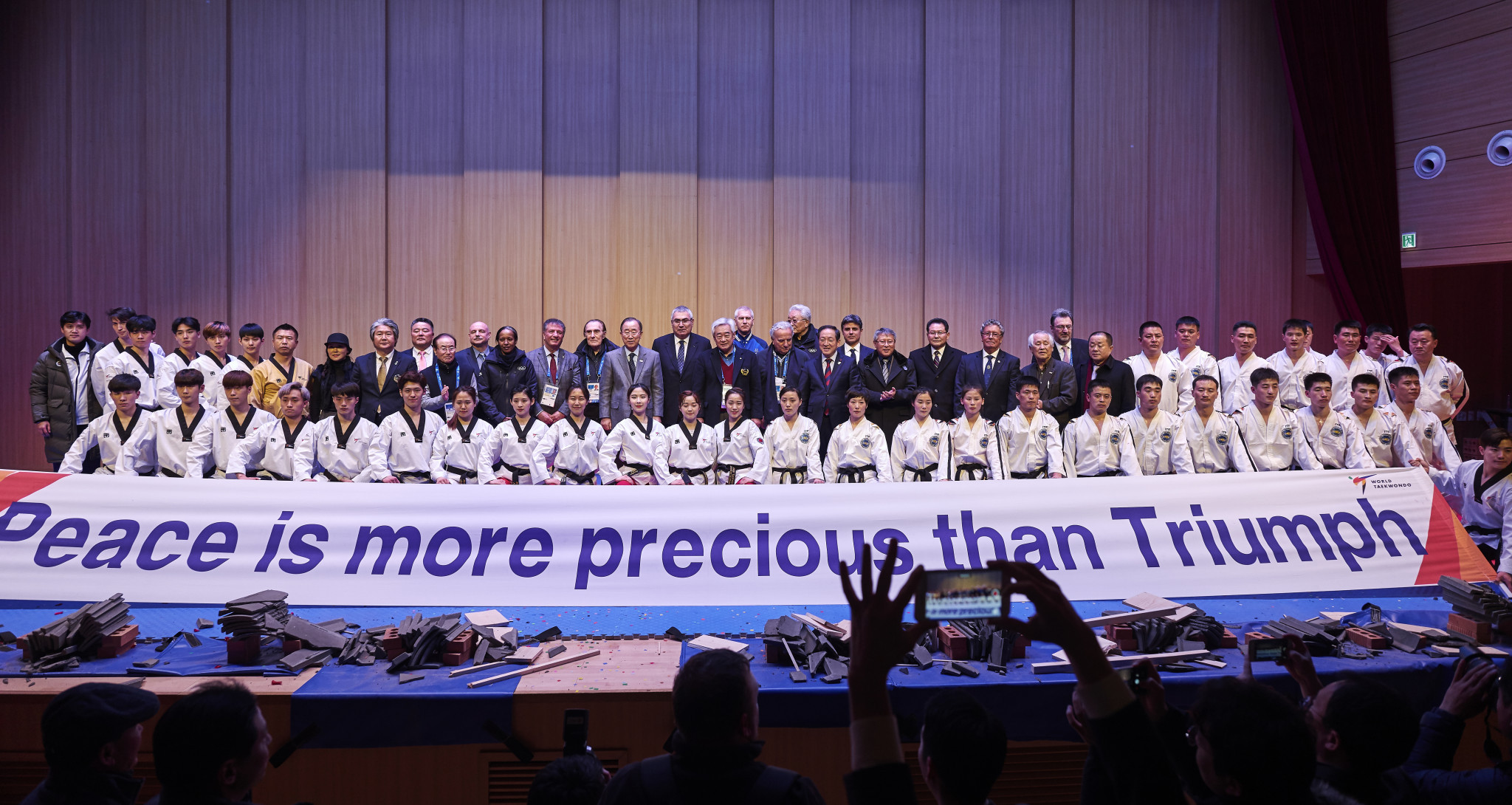Peace through flying planks of wood as North and South Korea unite for taekwondo demonstration