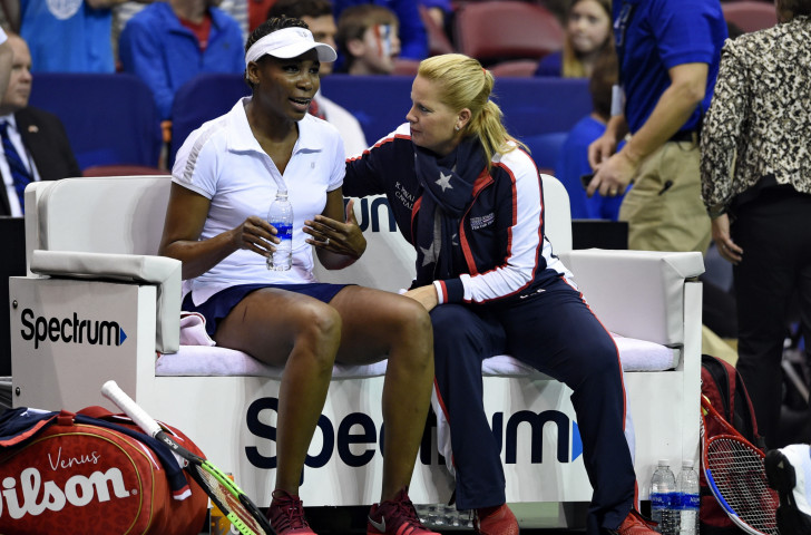 Venus Williams talks to the United States coach Kathy Rinaldi during her Fed Cup victory in Asheville today - her 20th Fed Cup win in her 1,000th professional singles match ©Getty Images