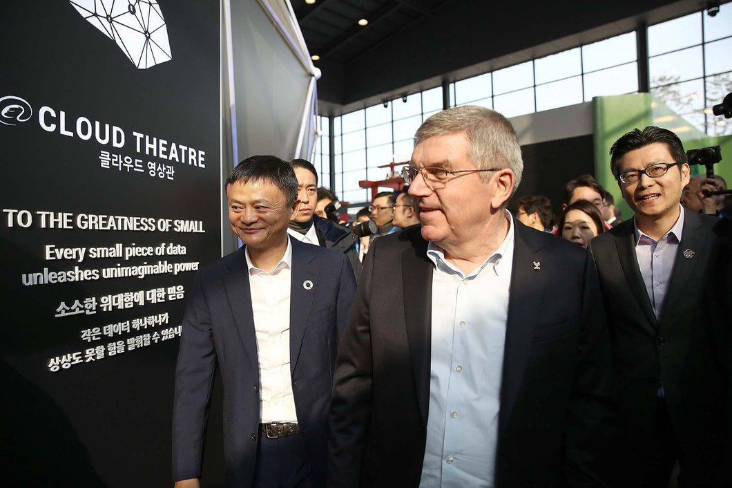 Alibaba founder Jack Ma, left, alongside IOC President Thomas Bach at the opening of the new  