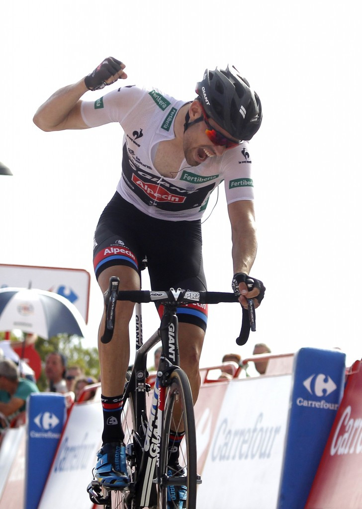 Tom Dumoulin celebrates after crossing the line for a superb stage victory ©Getty Images