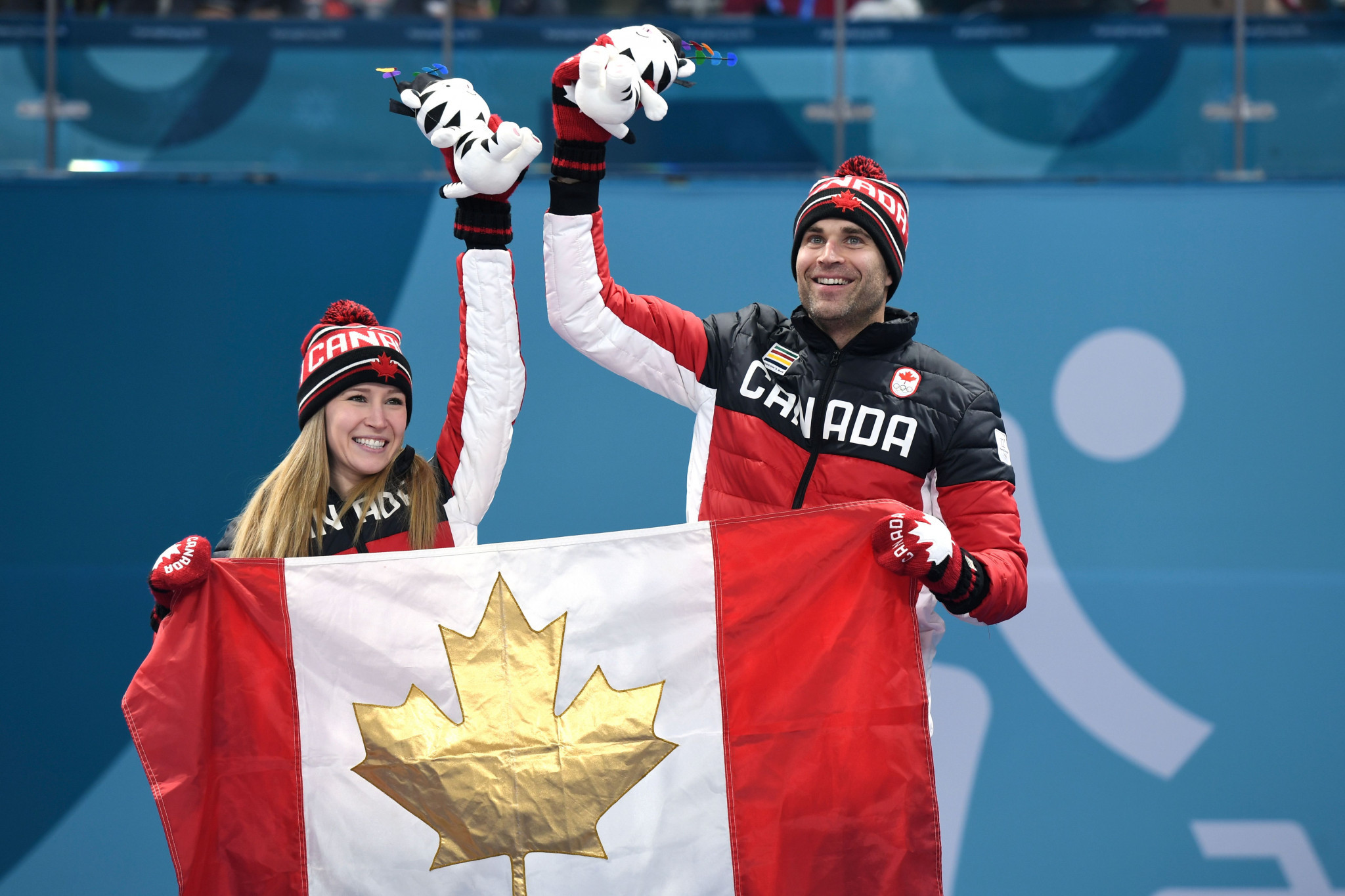 Canada's Kaitlyn Lawes and Canada's John Morris won the mixed doubles curling ©Getty Images