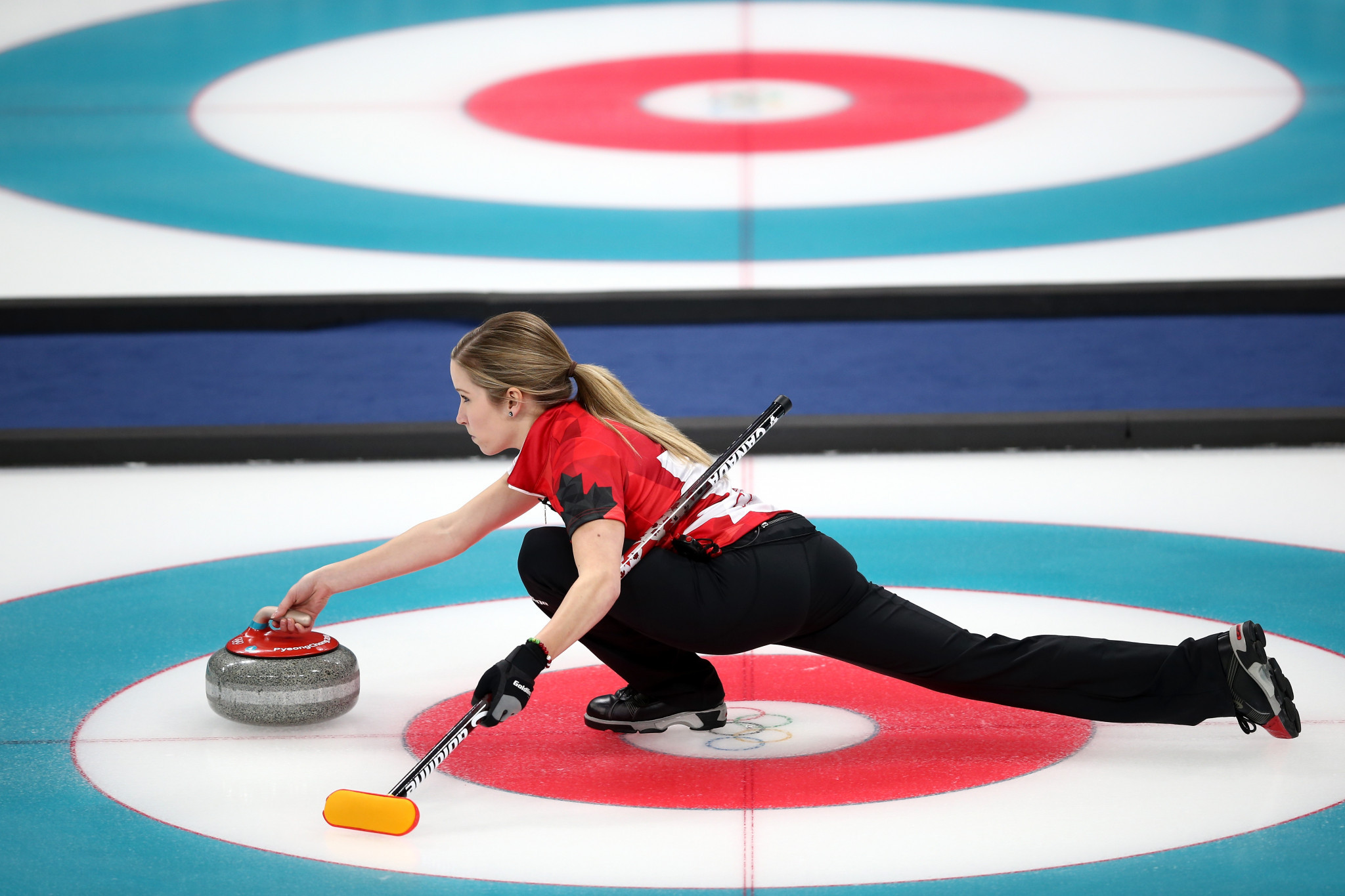 Canadian duo Kaitlyn Lawes and John Morris became the first team to win an Olympic Games mixed doubles curling gold medal ©Getty Images