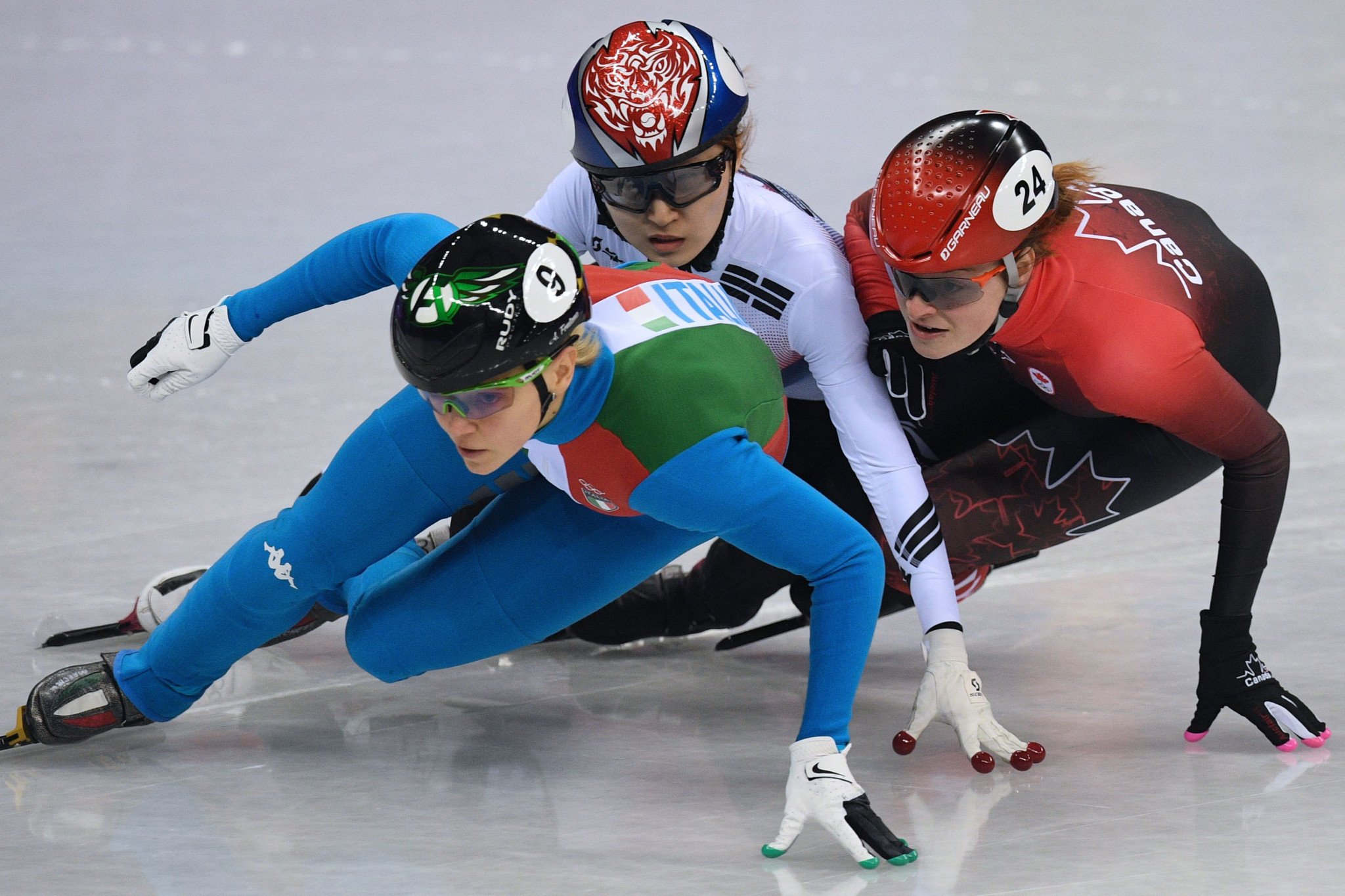 Kim Boutin, right, was promoted to bronze after the disqualification of South Korea's Choi Minjeong, centre ©Getty Images