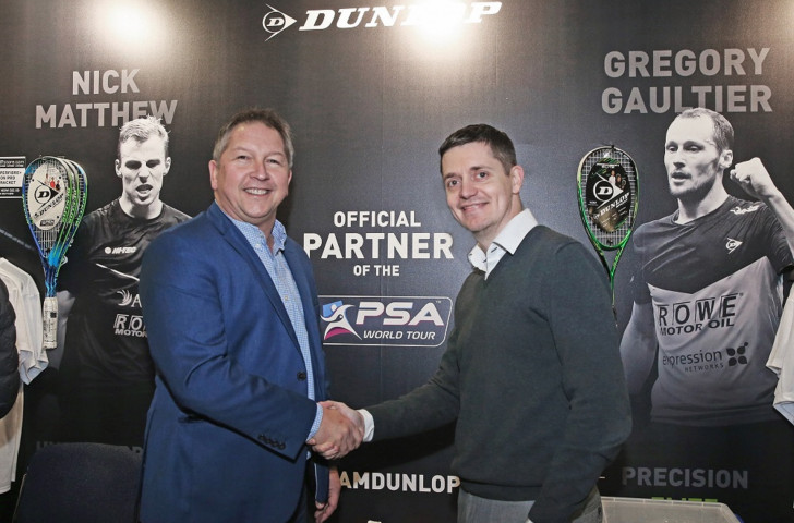 Tommy Berden, right, chief commercial officer for the Professional Squash Association, shakes hands with Dunlop's UK general manager Steve Heatley to mark their new three-year extended deal ©PSA