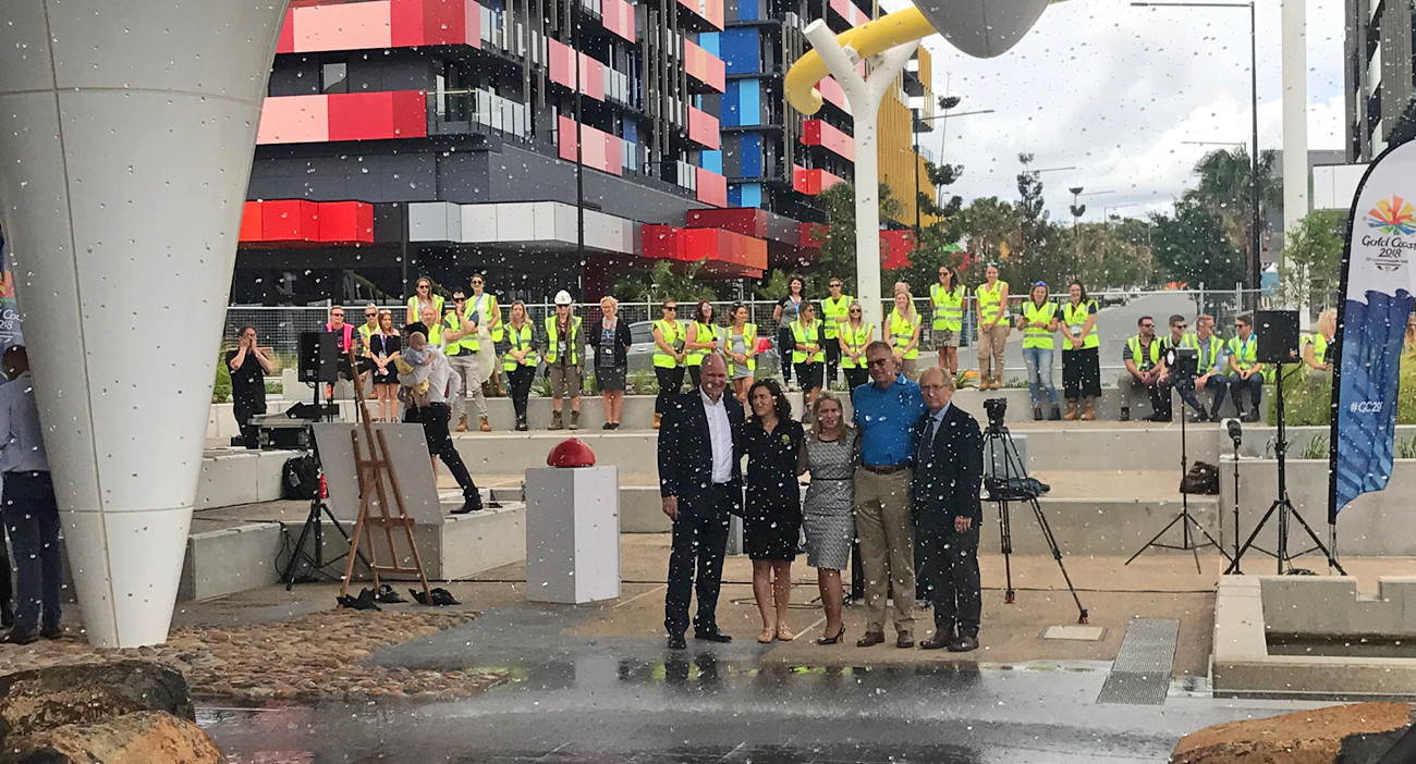 Co-Mayors Mark Stockwell, second right, and Sara Carrigan, second left, helped turn on a fountain located in the middle of the Athletes Village following the announcement of their appointments ©Gold Coast 2018