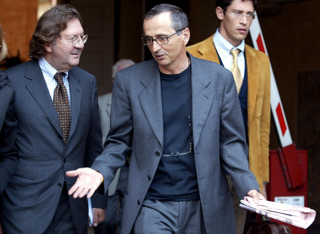 Michele Ferrari (centre) is set to provide evidence to the Italian National Olympic Committee prosecutor this week ©CONI