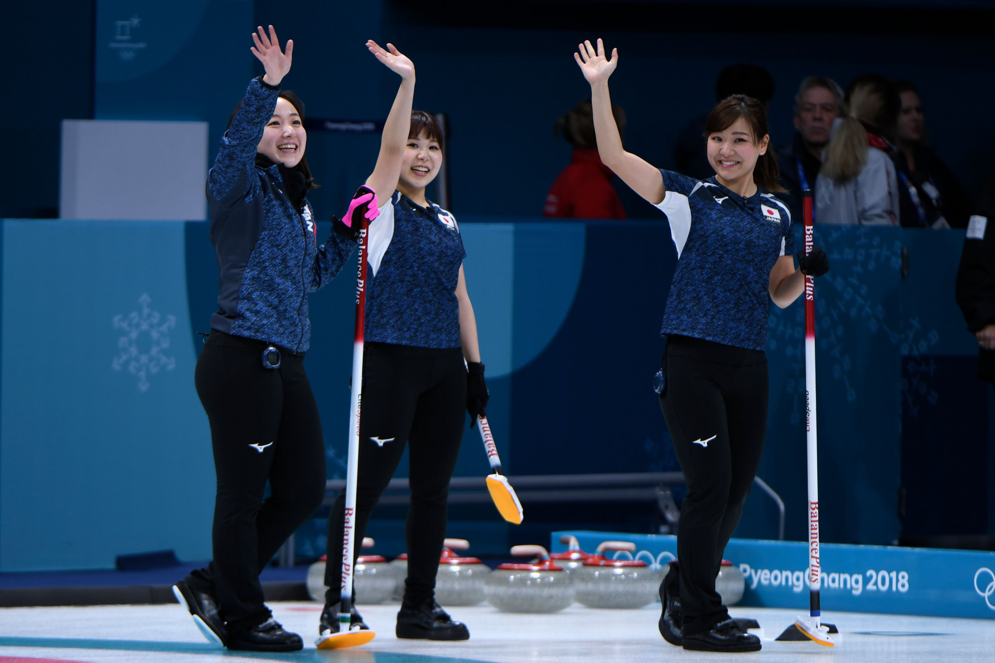 Japan's curling team celebrate a round-robin victory ©Getty Images