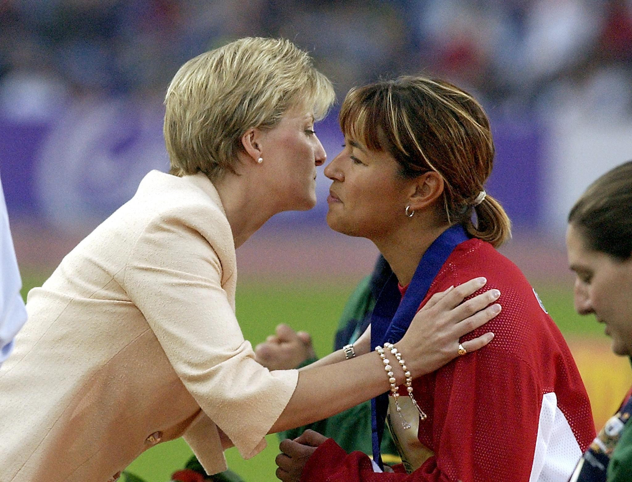 Chantal Petitclerc receives her 2002 Commonwealth Games gold medal from the  Countess of Wessex after winning the 800m - the first time an event for an athlete with a disability had been part of the officiall programme ©Getty Images