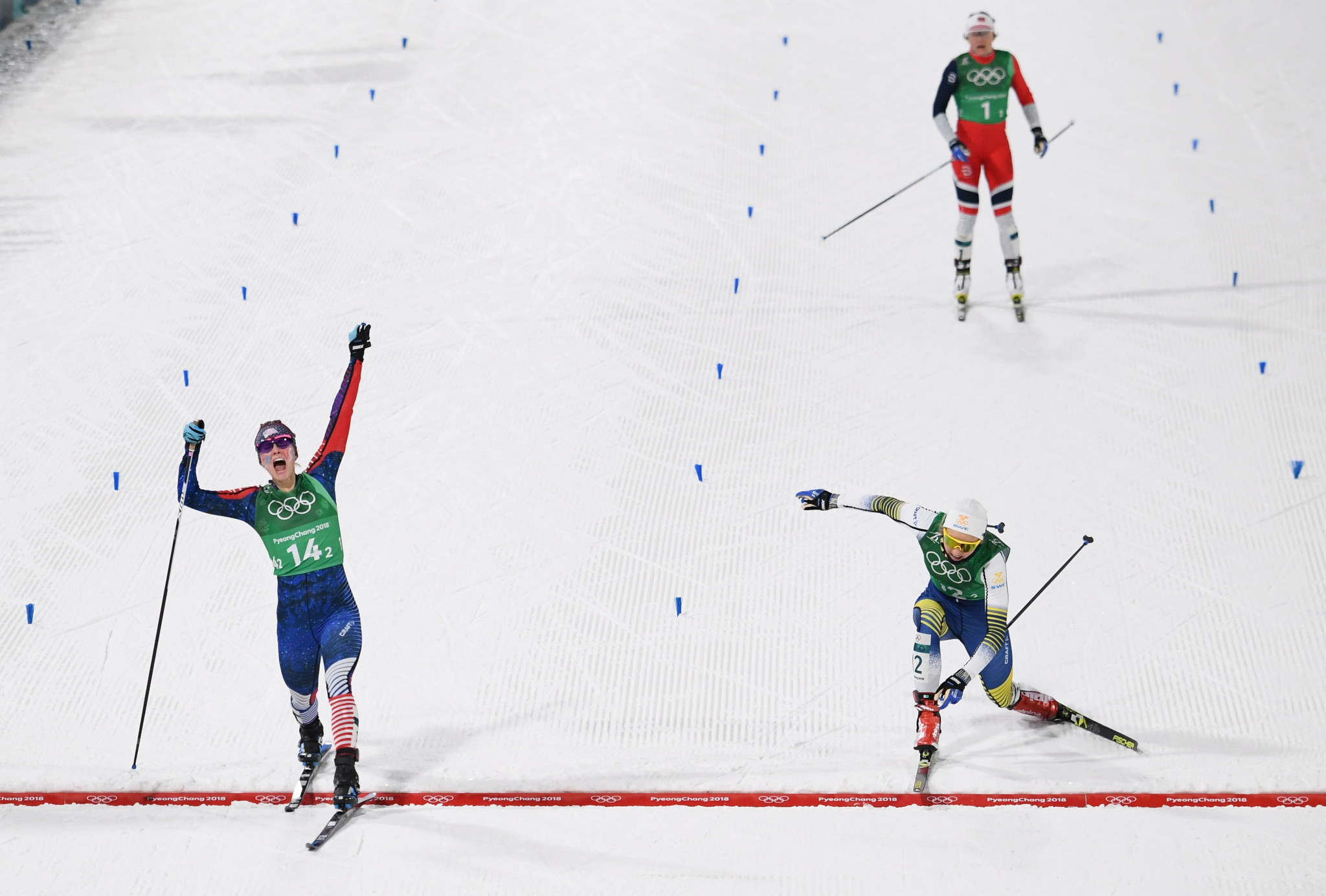 Jessica Diggins celebrates after sealing the United States' victory in the women’s cross-country skiing team sprint freestyle event at Pyeongchang 2018 ©Getty Images