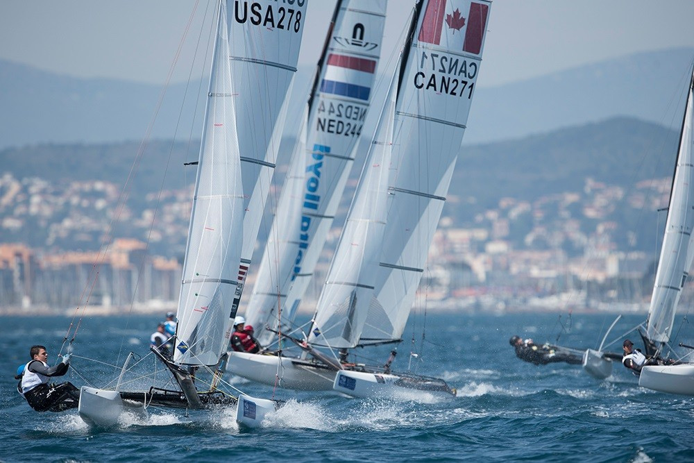 Billy Besson and Marie Riou of France won two of the four Nacra 17 races on the second day to lead the class