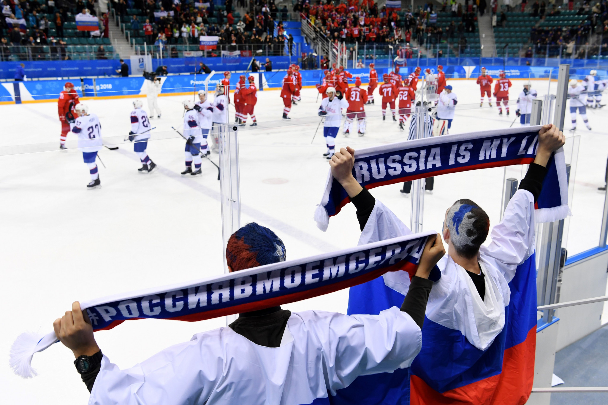 Russian supporters cheer on the OAR team as they beat Czech Republic in the men's ice hockey today