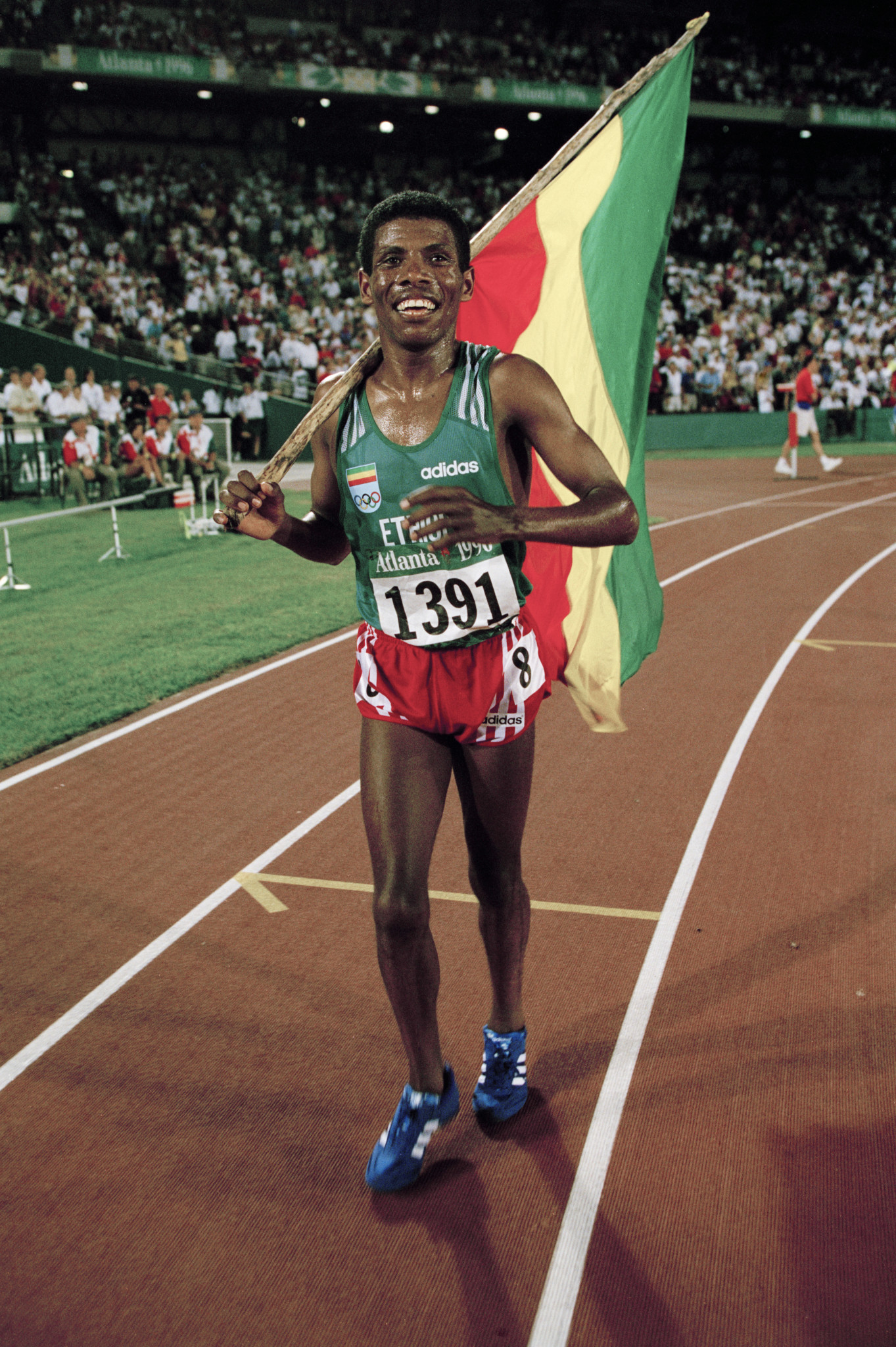 Memorabilia from Ethiopia's multiple world and Olympic champion Haile Gebreselassie, pictured after winning 10,000m gold at the 1996 Atlanta Games, will be among items donated to the new IAAF Heritage department this week at the IAAF World Indoor Championships
©Getty Images
