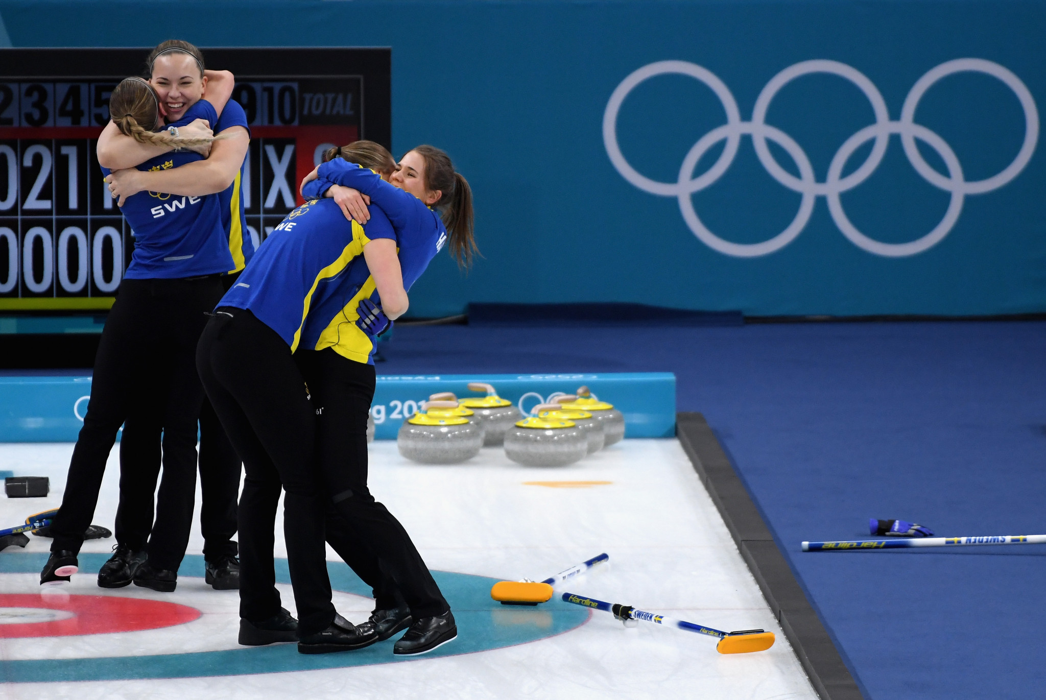 Sweden celebrate after ending host nation hopes in the women's curling final ©Getty Images