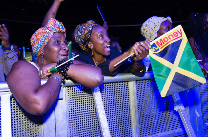 Guests at Jamaica House in London's O2 Centre watch the athletics at the IAAF World Championships last year. At the Gold Coast 2018 Games in April, Jamaica Commonwealth Manor will be based at a bar complex ©Getty Images
