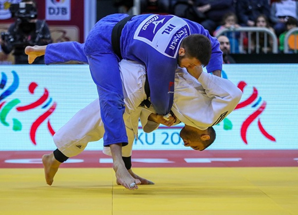 Georgia's Varlam Liparteliani, in white, won his first IJF Grand Slam title since moving up to the under-100kg category with victory over Ireland's Ben Fletcher ©IJF