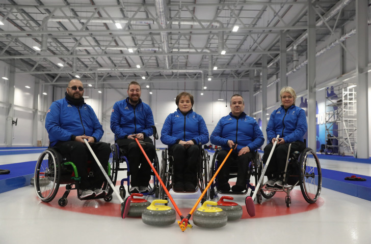 The ParalympicsGB wheelchair curling team for next month's Pyeongchang Games line up at the National Curling Centre - they and all other Para-athletes under the UK banner have a new code of classification ©Getty Images