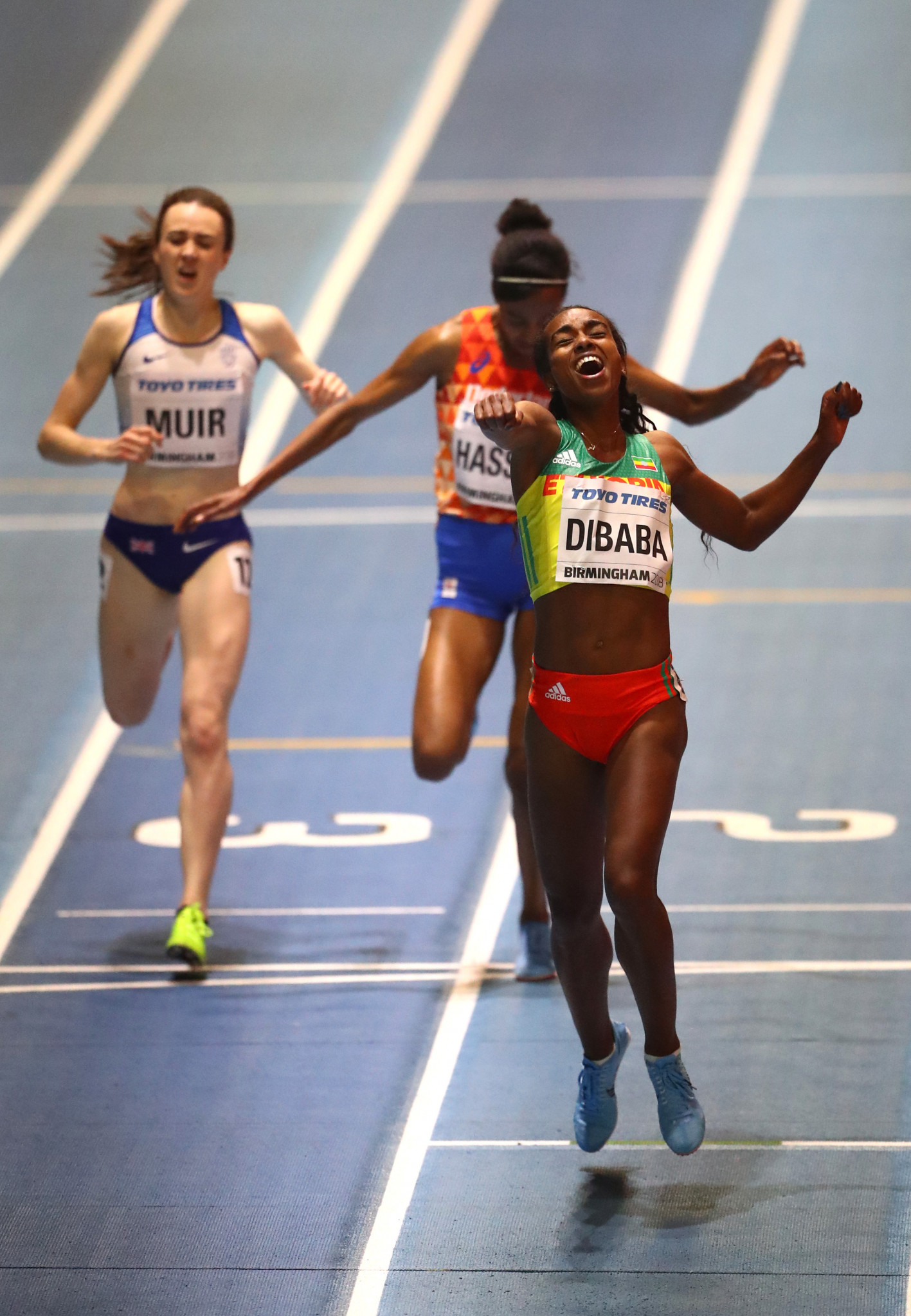 Genzebe Dibaba of Ethiopia displays rare emotion as she retains her IAAF World Indoor 3,000m title on the opening evening of the Championships at Arena Birmingham, with silver going to Sifan Hassan of The Netherlands, and bronze to Britain's Laura Muir ©Getty Images

