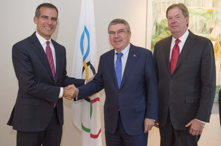 Los Angeles Mayor Eric Garcetti (left) with IOC President Thomas Bach (centre) and USOC chairman Larry Probst (right) in Lausanne