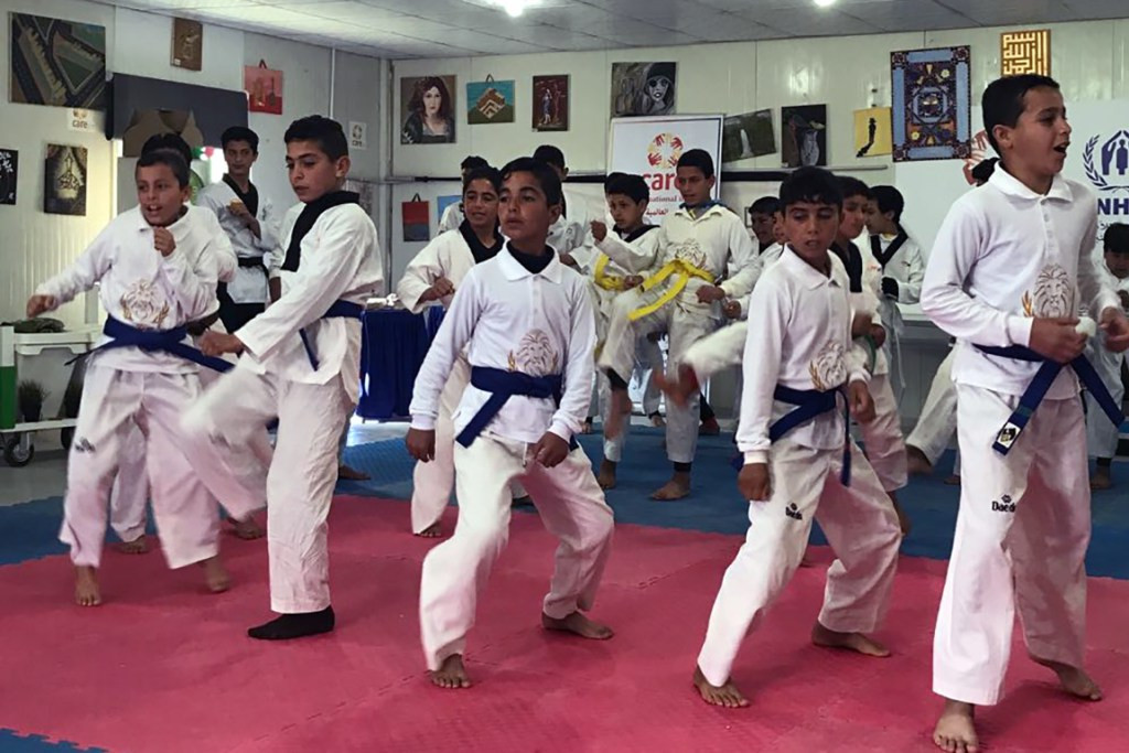 Youngsters who have fled the Syrian crisis practice taekwondo at the Academy at Azraq ©THF